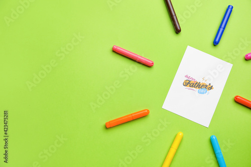 Greeting card for Father's Day celebration on color background