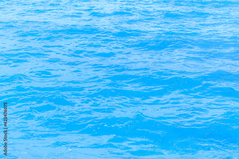 Abstract photo of surface motion water of sea or ocean with beautiful sky blue light tone. Abstract photo of surface motion water of sea or ocean with beautiful sky blue light tone.