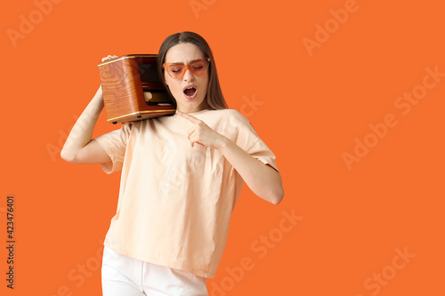 Cool young woman with retro...