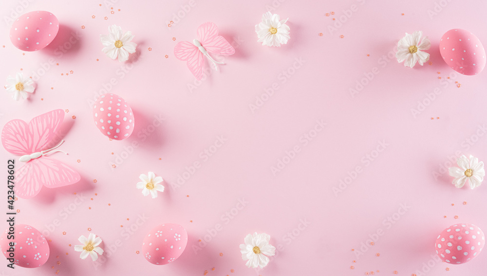 Happy easter! Colourful of Easter eggs in with flower on pastel pink background. Greetings and presents for Easter Day celebrate time. Flat lay ,top view. Happy easter! Colourful of Easter eggs in with flower on pastel pink background. Greetings and presents for Easter Day celebrate time. Flat lay ,top view.