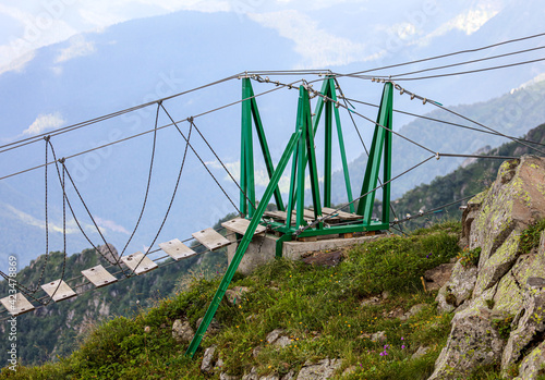 Suspension bridge on the mountainside.