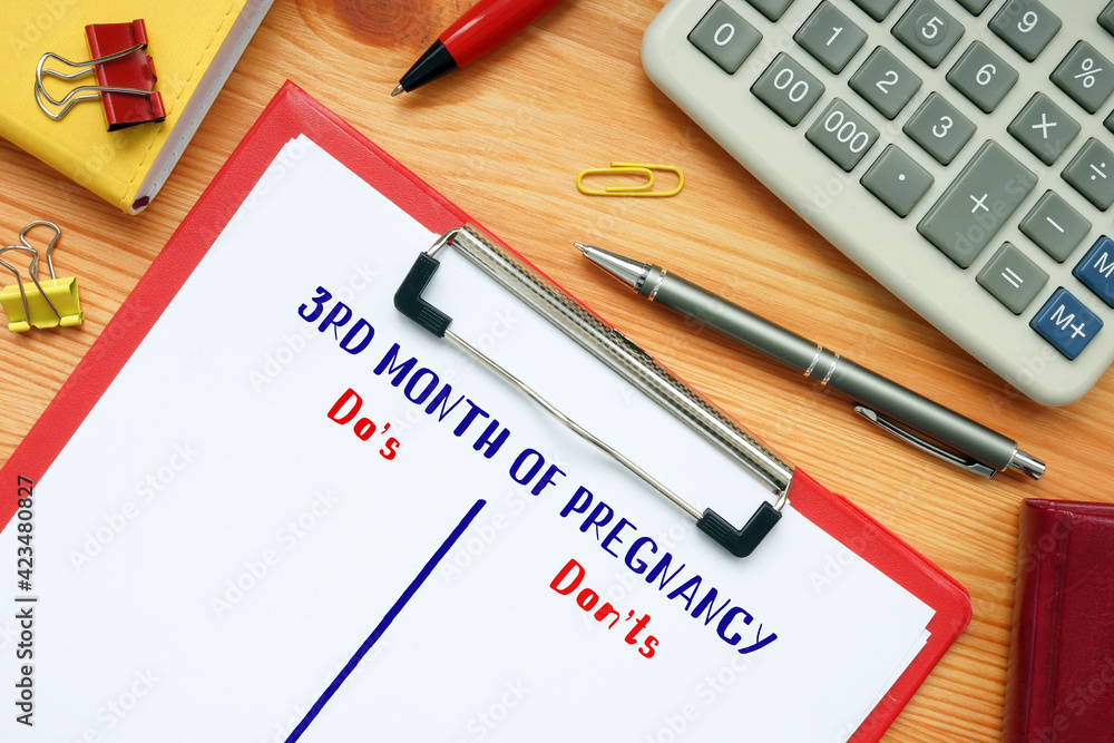 Business concept meaning 3RD MONTH OF PREGNANCY Do's and Don'ts with inscription on the page. Business concept meaning 3RD MONTH OF PREGNANCY Do's and Don'ts with inscription on the page.