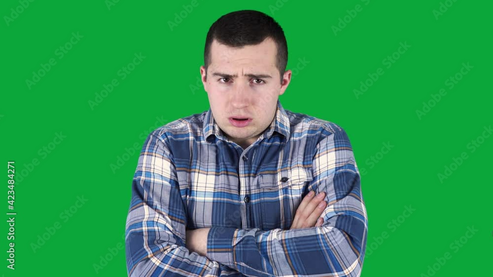 a man trying to keep warm by moving in place on a green screen. a man trying to keep warm by moving in place on a green screen.