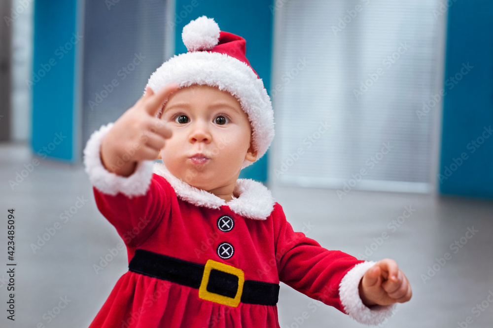 Beautiful little baby in Santa costume Beautiful little baby in Santa costume