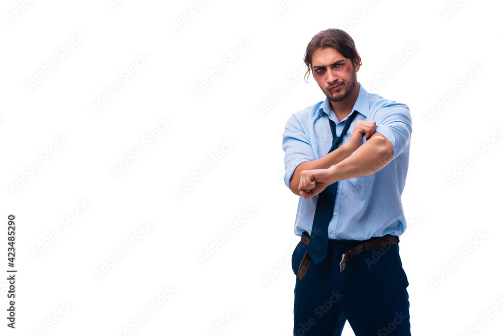 Fototapeta premium Young unhappy male employee isolated on white