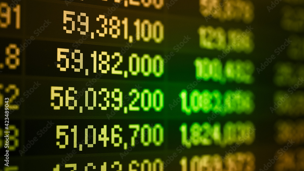 Stock market data on digital LED display. Fundamental and technical analysis with candle stick graph chart of stock market trading to represent about Bullish and Bearish point. Stock market data on digital LED display. Fundamental and technical analysis with candle stick graph chart of stock market trading to represent about Bullish and Bearish point.