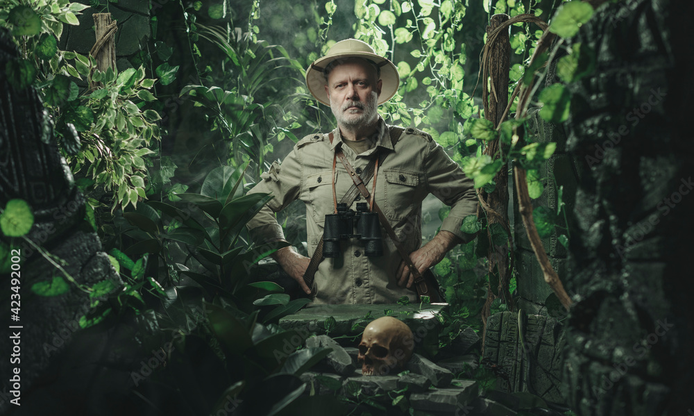Confident vintage style adventurer exploring the jungle