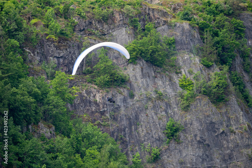 Paraglider in the Mountains in summer time.