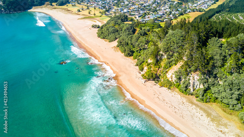 Aerial view of a sunny beach. Coromandel, New Zealand.