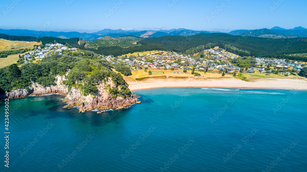 Little Town on the shore of a beautiful harbour. Coromandel, New Zealand.