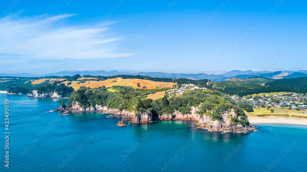 Little Town on the shore of a beautiful harbour. Coromandel, New Zealand.