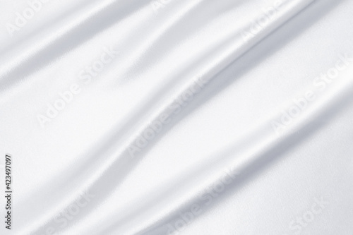 Luxury smooth elegant iredescent white silk fabric texture as background Abstract background