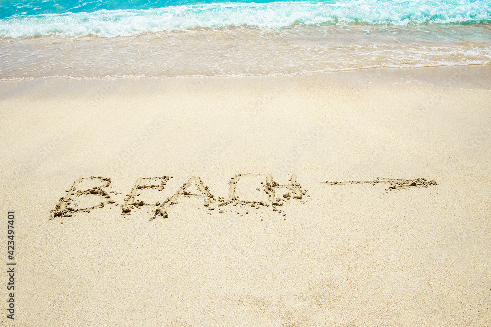 beautiful drawing on the sand near the sea shore background beautiful drawing on the sand near the sea shore background