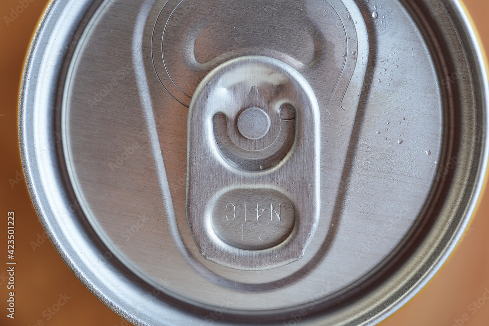 The cover from the aluminum can in macro mode The cover from the aluminum can in macro mode