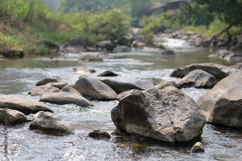 Many rocks in the rapids in the summer, the water level drops