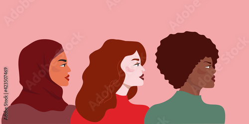 Women of different races  nationalities  skin color and hair stand in profile  looking in one direction.  The concept of feminism  female friendship  sisterhood  tolerance  equality. Vector graphics.