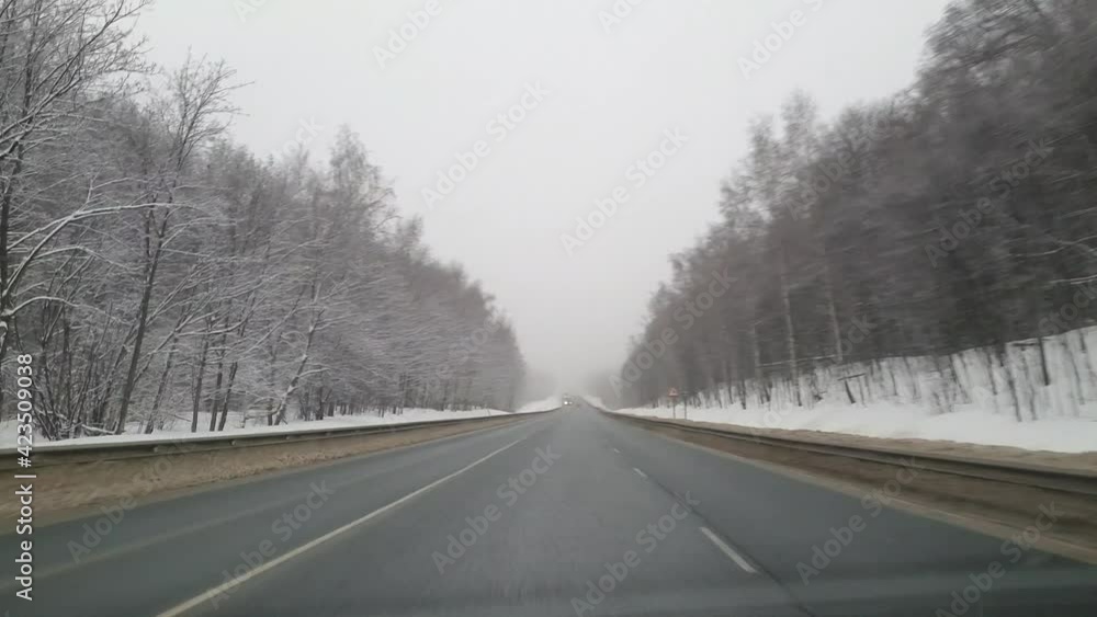car rides on a winter road in the mountains of fog, first-person view, filmed on a mobile phone car rides on a winter road in the mountains of fog, first-person view, filmed on a mobile phone