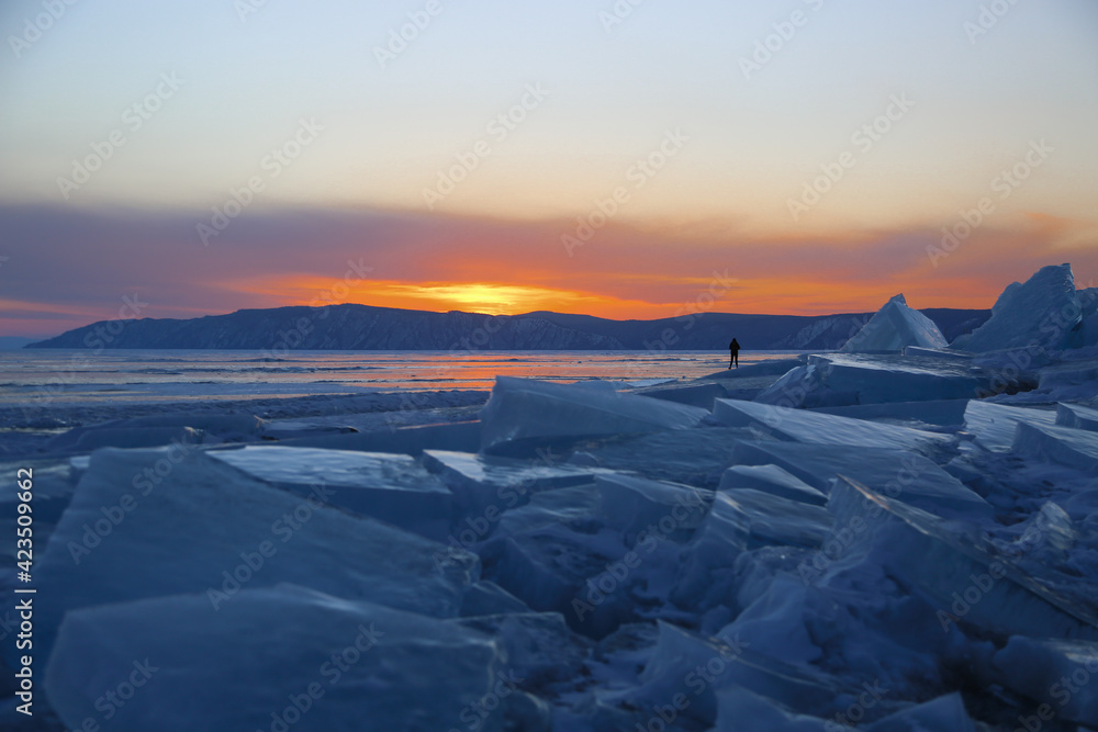 Sunset time in winter on the lake Baikal Russia.