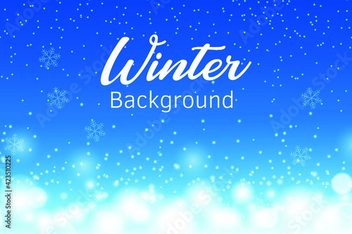 Winter snowfall on light blue background. Cold winter Christmas and New Year background.