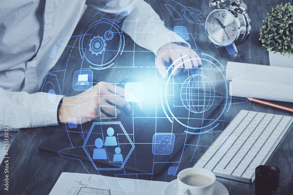 Double exposure of man's hands holding and using a phone and social network theme drawing. Double exposure of man's hands holding and using a phone and social network theme drawing.