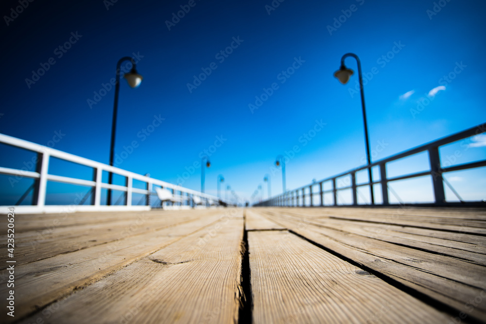 Pier under beautiful blue sky