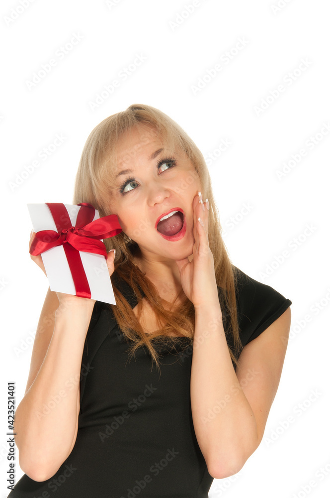 Fototapeta premium beautiful blonde woman and gift postcard in her hands. feast day of St. Valentine