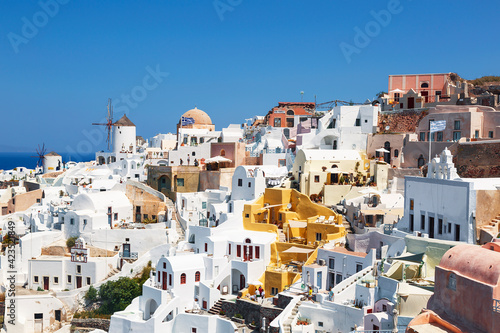 View of the town of Oia on Santorini island on a sunny summer day. Greece