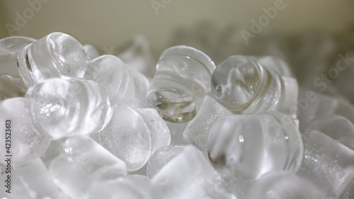close-up of food grade ice blocks inside ice machine