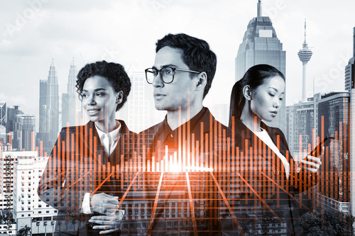 Photography Group of business colleagues in suits as a part of multinational corporate team working on forecasting trading corporate strategy at fund