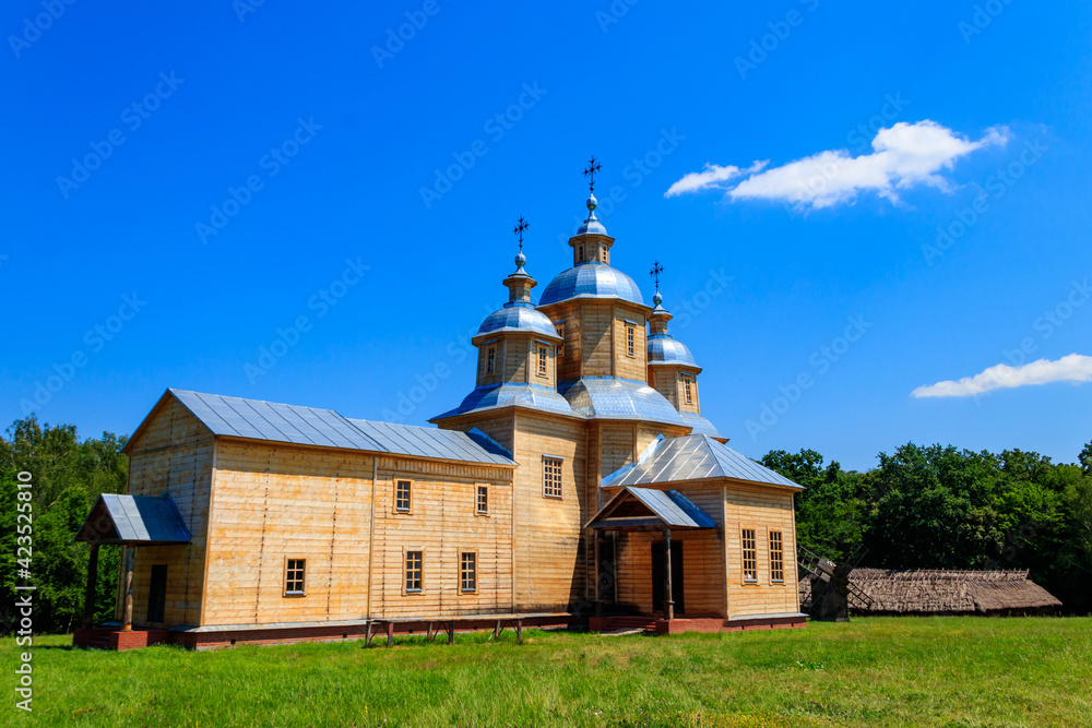 Ancient reconstructed wooden church of St. Nicolas in Pyrohiv (Pirogovo) village near Kiev, Ukraine