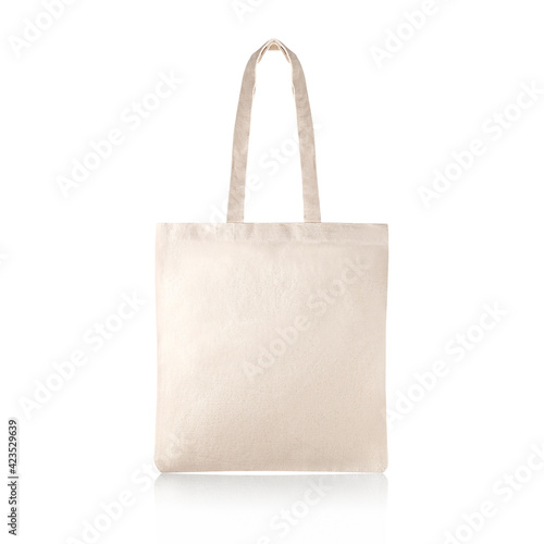 Blank Eco Friendly Beige Colour Fashion Canvas Tote Bag Isolated on White Background. Empty Reusable Bag for Groceries. Clear Shopping Bag. Design Template for Mock-up. Front View. Studio Photography.