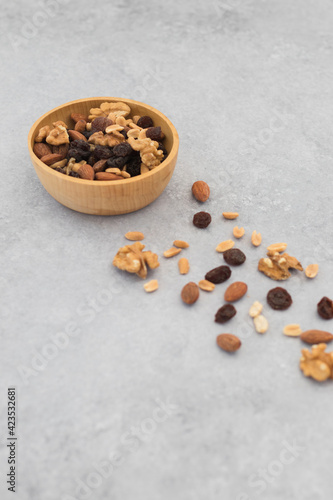 Mix of nuts in a wood bowl