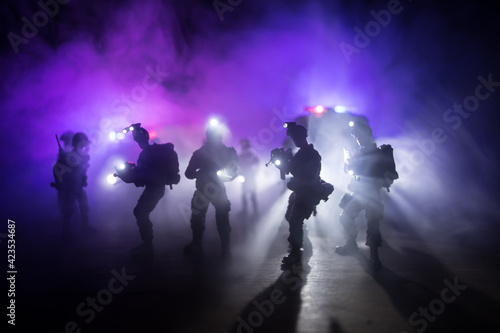 Fotografia Anti-riot police give signal to be ready