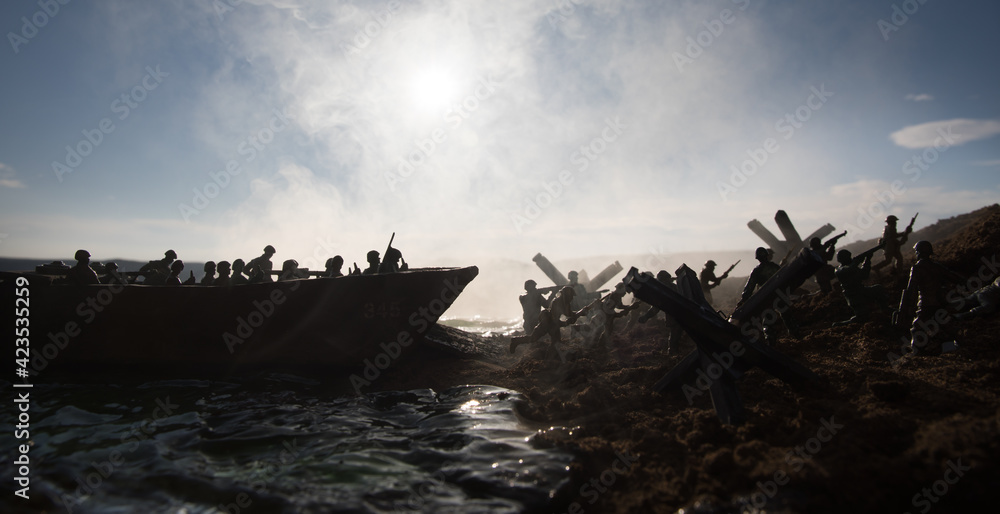 World War 2 reenactment (D-day). Creative decoration with toy soldiers, landing crafts and hedgehogs. Battle scene of Normandy landing on June 6, 1944.