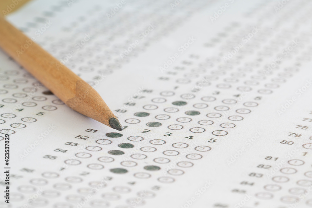 close up pencil on answer sheets, education concept close up pencil on answer sheets, education concept