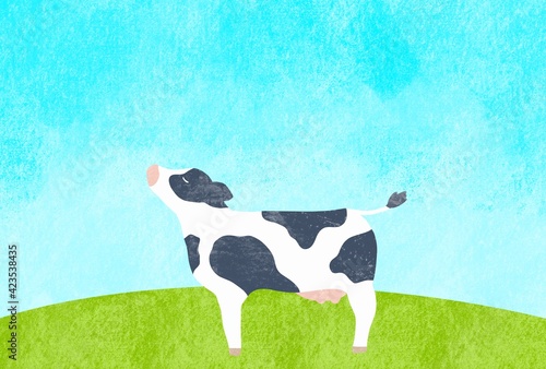 お天気な日に草原で佇む牛さんのイラスト