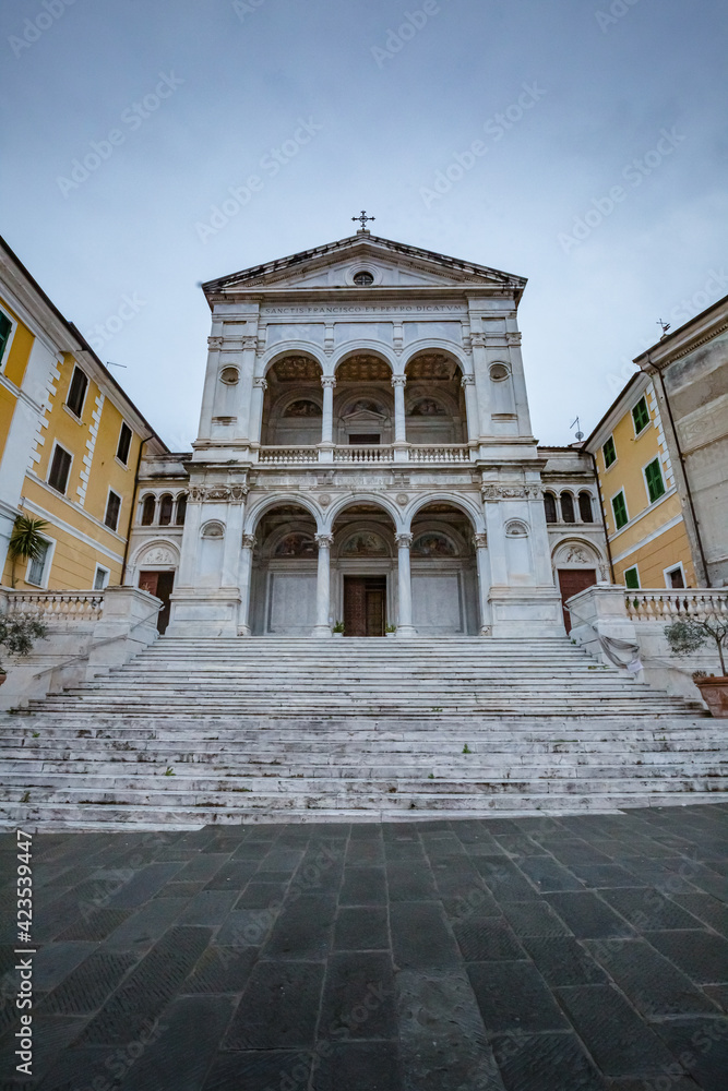 Cityscape. View of facade exterior of Saint Peter and Francis cathedral (Duomo) in Massa-Carrara, Tuscany, Italy