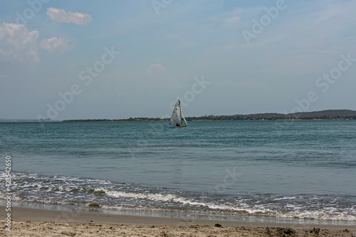typical sailboat on the beaches of Castillogrande de Cartagena.
