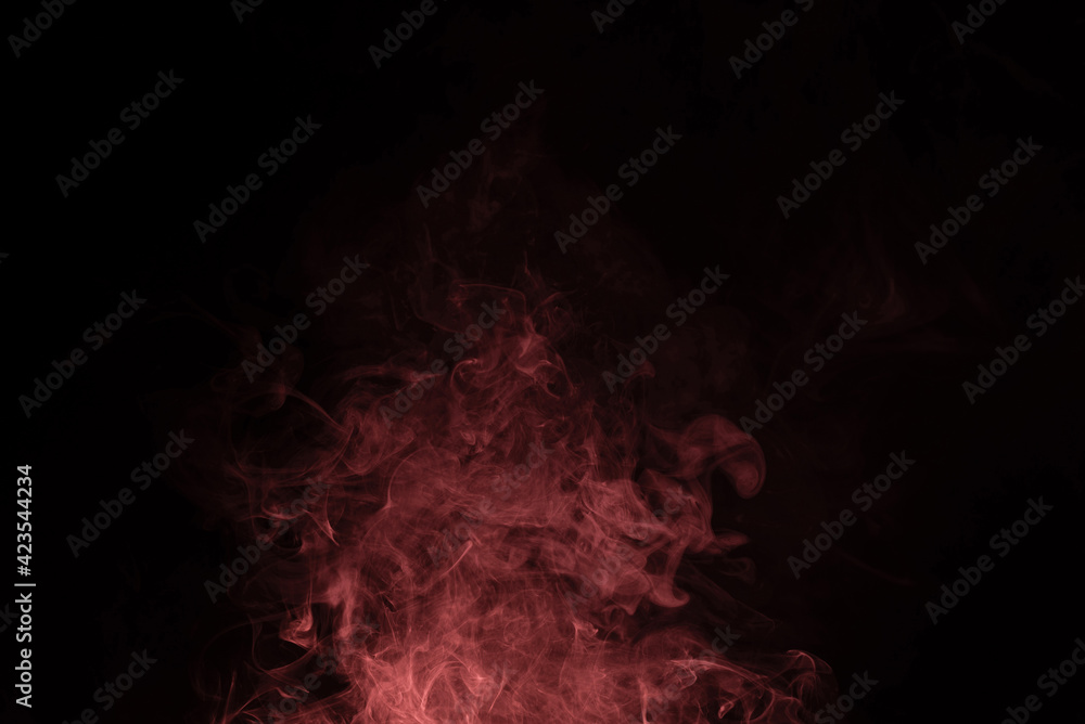 Fototapeta premium Yellow and pink steam on a black background.