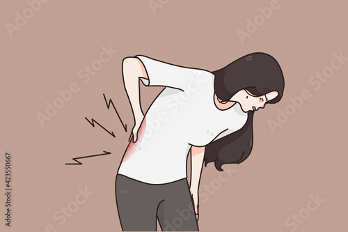 Suffering from Chronic back pain concept. Young woman standing holding her lower back suffering from unbearable pain vector illustration 