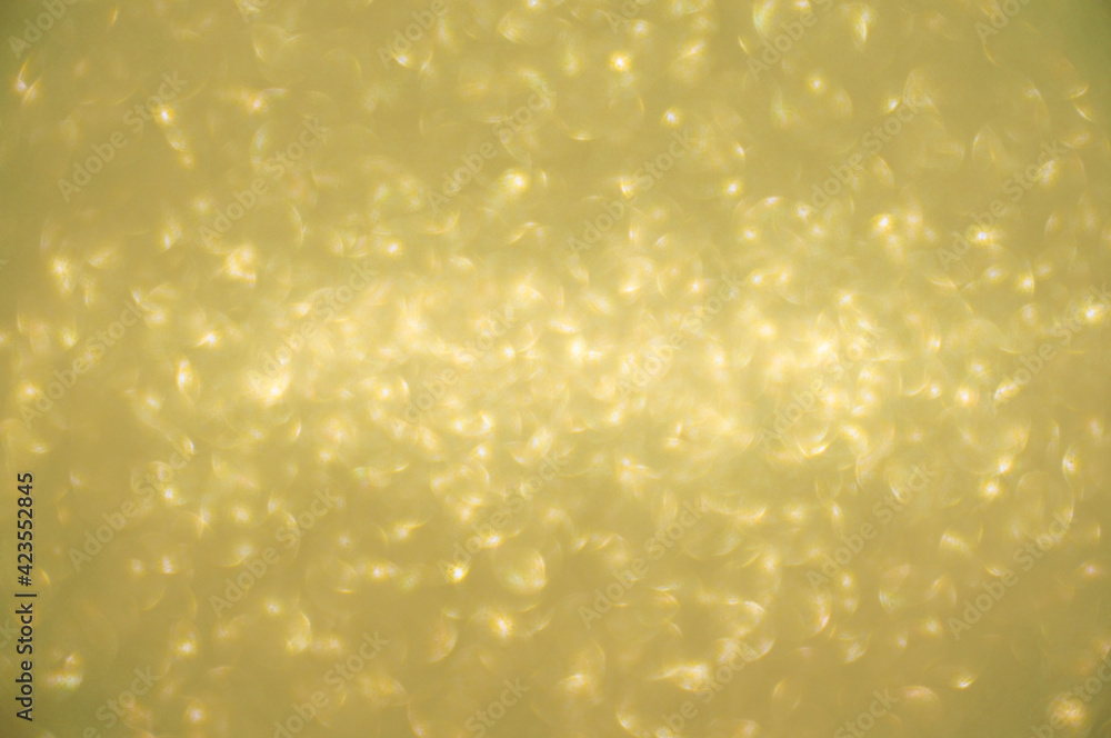 Gold glitters background. shimmering blur spot lights Bokeh Shiny gold light background. Gold glitters background. shimmering blur spot lights Bokeh Shiny gold light background.