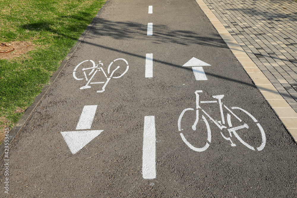 Fototapeta premium Bicycle path. Bicycle lane sign on a road. 