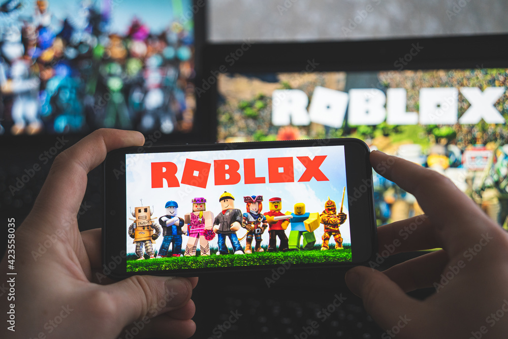 Roblox is an online game platform and game creation system. It allows users  to program games and play games created by other users. Stock Photo