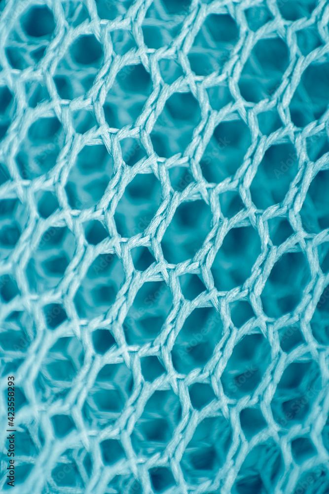 Obraz premium Blue mesh background. Mesh texture. Macro photo