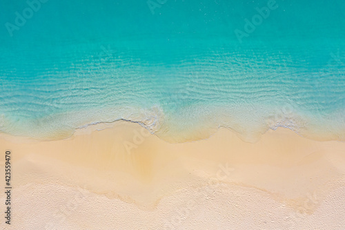 Top view aerial photo from drone of stunning beautiful sea landscape beach with turquoise water with copy space for your text. Beautiful sand beach with turquoise water. Relax nature, amazing beach