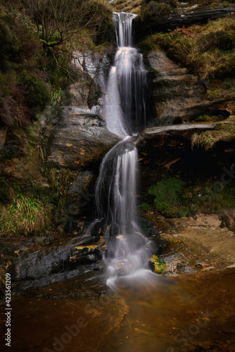 close up of the john knox waterfall in the lomond hills, fife, scotland.