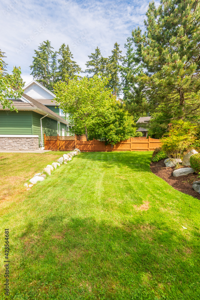 Fragment of a house with gorgeous outdoor landscape in suburbs of Vancouver, Canada Fragment of a house with gorgeous outdoor landscape in suburbs of Vancouver, Canada