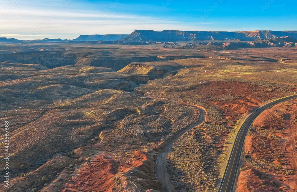 Aerial view from drone, beautiful landscape of red and orange rock formations along the road in Utah, USA