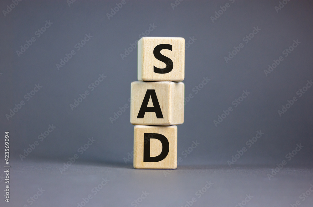 SAD, social anxiety disorder symbol. Concept words 'SAD, social anxiety disorder' on cubes on a beautiful grey background. Medical, psychological and SAD, social anxiety disorder concept. Copy space. SAD, social anxiety disorder symbol. Concept words 'SAD, social anxiety disorder' on cubes on a beautiful grey background. Medical, psychological and SAD, social anxiety disorder concept. Copy space.