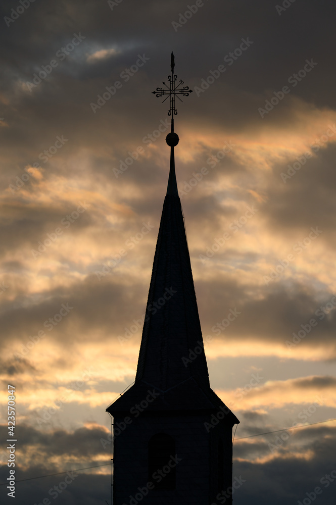 Obraz premium church spire with weathercock on it